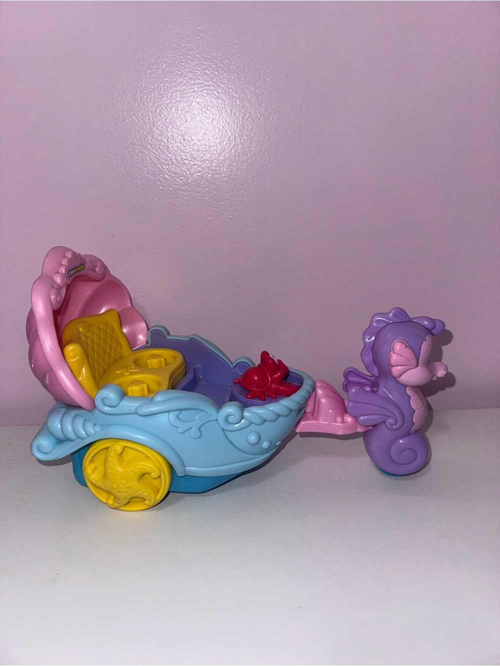 Seahorse Pull-Along Carriage Toy in Pink, Blue, Purple & Yellow